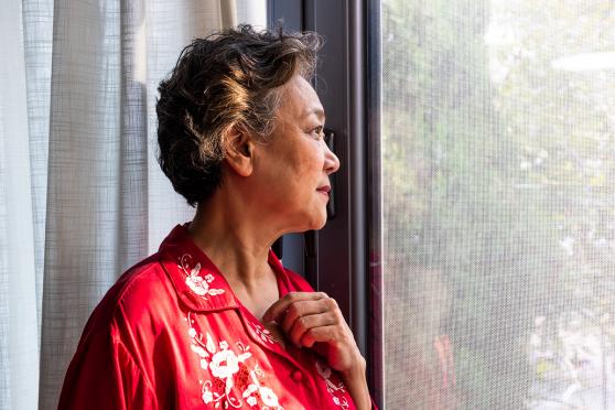 Older adult woman thinking about the difference between dizziness and vertigo