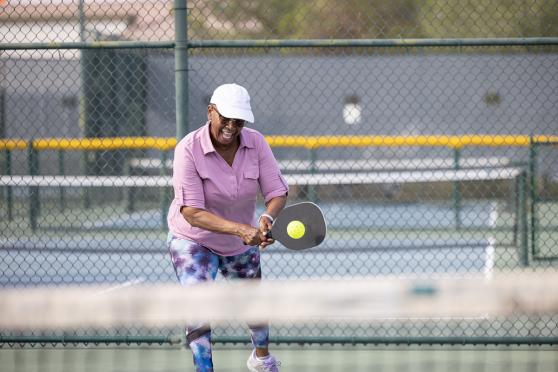 A person playing pickleball