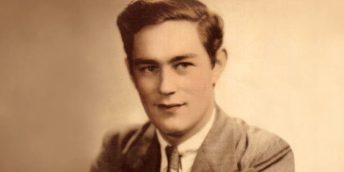 hm-1200×600-1 An old photo of a man in a suit and tie