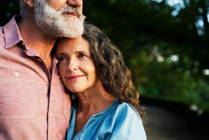 A man and a woman standing next to each other
