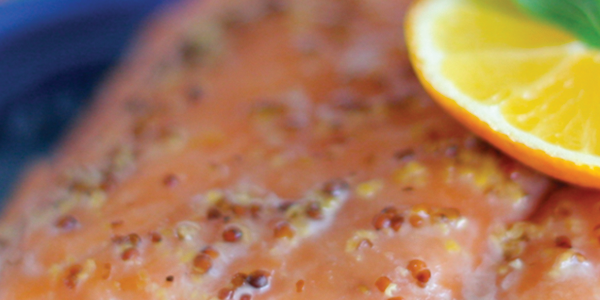 A close up of a piece of food with a lemon