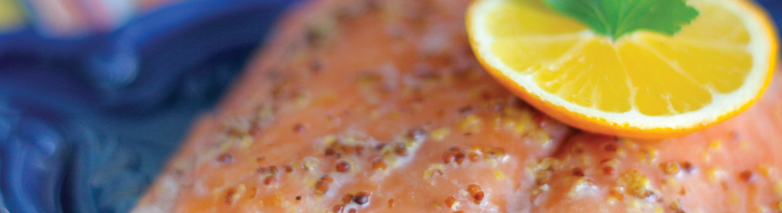 A close up of a piece of food with a lemon