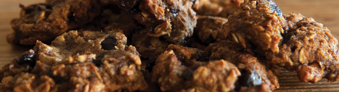 A pile of food sitting on top of a wooden table