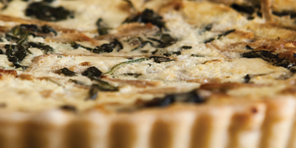 A close up of a pie on a plate