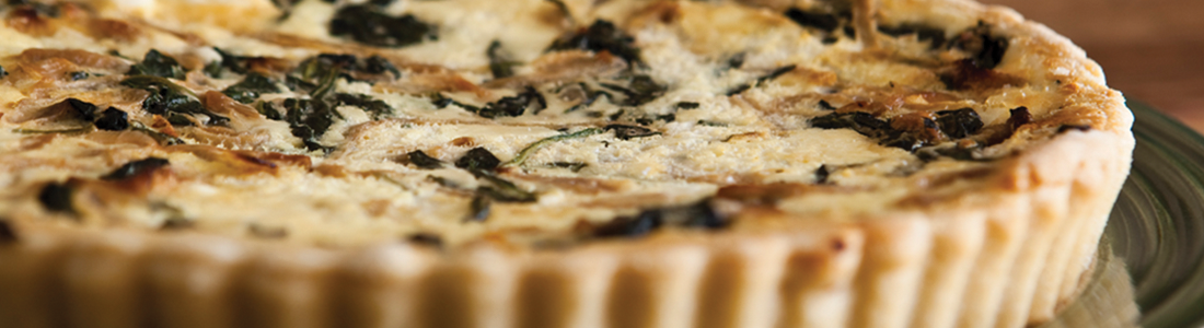 A close up of a pie on a plate