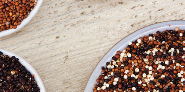 feta Three bowls filled with different types of seeds