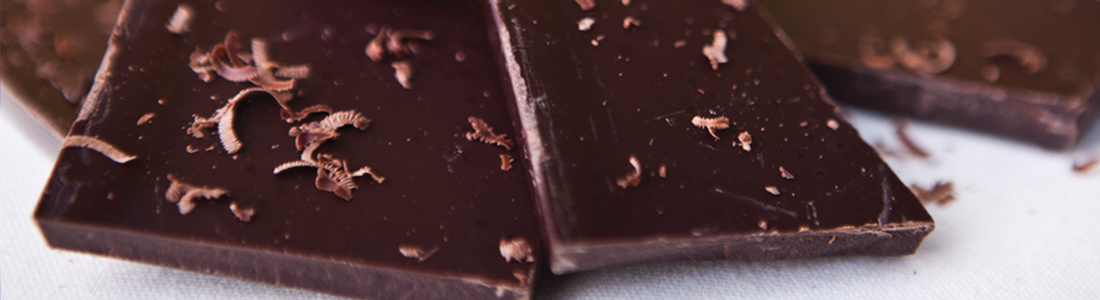 A close up of pieces of chocolate on a table