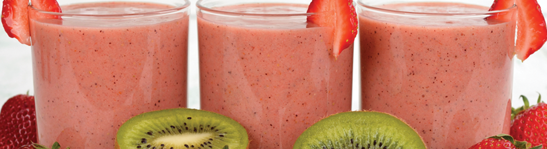 Three glasses of smoothie with strawberries and kiwi