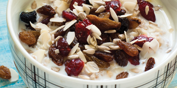 oatmeal A bowl of oatmeal with raisins and nuts
