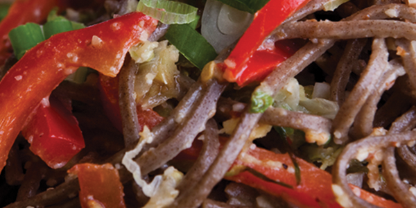 soba A close up of a plate of food with broccoli
