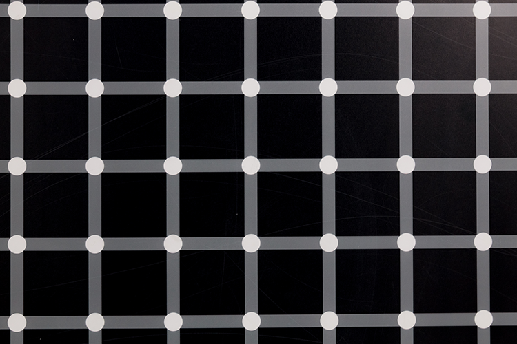 A close up of a black and white checkered pattern