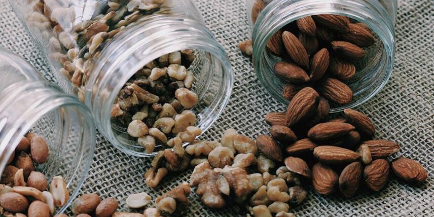 NutsforBrainHealth_923732146_10 A couple of jars filled with nuts on top of a table